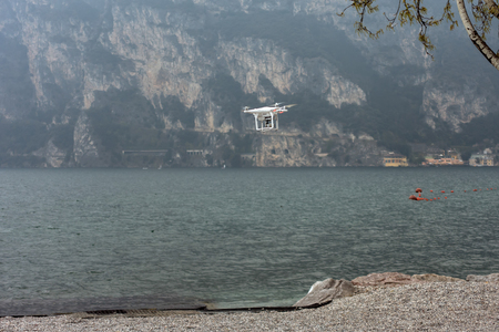 Drone hovering on the Shoreline at Riva del Gardaの写真素材