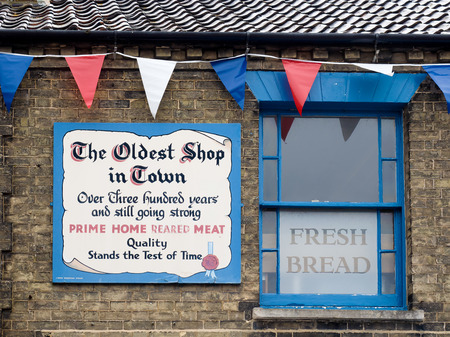 Sign outside a Shop in Southwold Commemorating over 300 Years of Tradingのeditorial素材