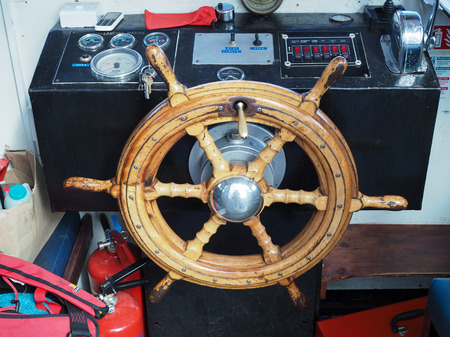 Ship's Wheel in the Cabin of the Mark Twain Tourist Boat on the River Deeのeditorial素材