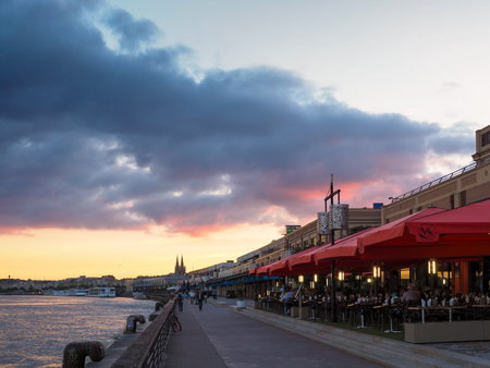 Restaurant Filled with Diners next to the River Garonne at Bordeauxのeditorial素材