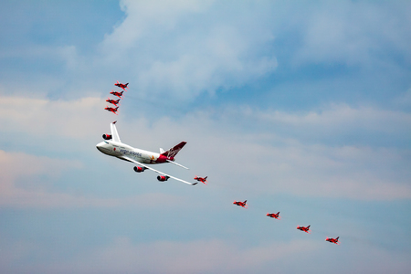 Virgin Atlantic Boeing 747-400 and Red Arrows Aerial Display at Biggin Hill Airshowのeditorial素材