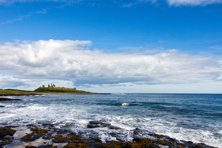View of Dunstanburgh Castle at Craster Northumberlandのeditorial素材