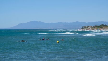 CABO PINO, ANDALUCIA/SPAIN - JULY 2 : People Surfing at Cabo Pino AndalucÃ­a Spain on July 2, 2017. Unidentified people.のeditorial素材