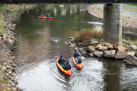 People Canoeing down the Vlatava River to Krumlovのeditorial素材