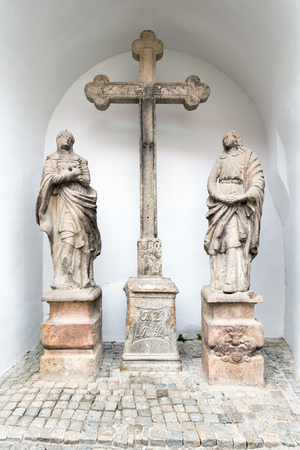 Statues outside St Vitus Cathedral in Krumlovの写真素材