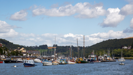 DARTMOUTH, DEVON/UK - JULY 28 : View of Various Boats Moored on the River Dart in Dartmouth Devon on July 28, 2012. Unidentified peopleのeditorial素材