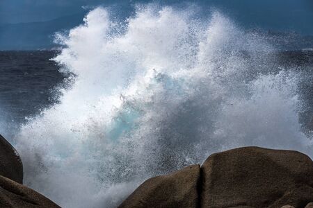 Waves Pounding the Coastline at Capo Testa Sardiniaの写真素材