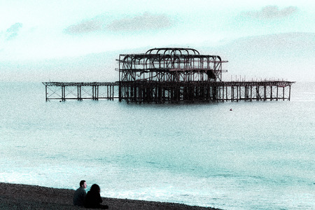 BRIGHTON, EAST SUSSEX/UK - JANUARY 26 : View of the derelict West Pier in Brighton East Sussex on January 26, 2018. Unidentified peopleのeditorial素材