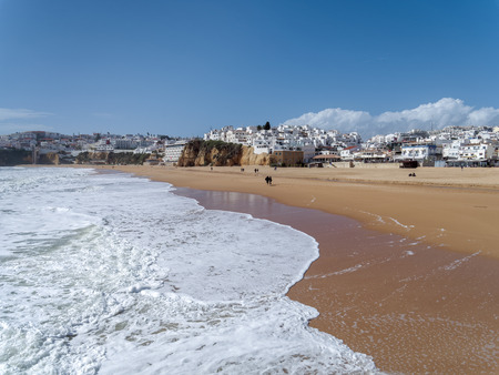ALBUFEIRA, SOUTHERN ALGARVE/PORTUGAL - MARCH 10 : View of the Beach at Albufeira in Portugal on March 10, 2018. Unidentified peopleのeditorial素材