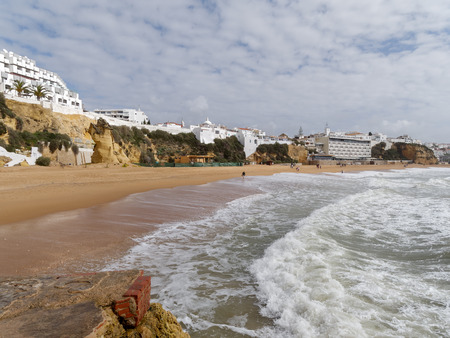 ALBUFEIRA, SOUTHERN ALGARVE/PORTUGAL - MARCH 10 : View of the Beach at Albufeira in Portugal on March 10, 2018. Unidentified peopleのeditorial素材