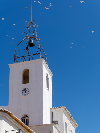 ALBUFEIRA, SOUTHERN ALGARVE/PORTUGAL - MARCH 10 : Bell Tower of Torre de Relogio in Albufeira Portugal on March 10, 2018のeditorial素材