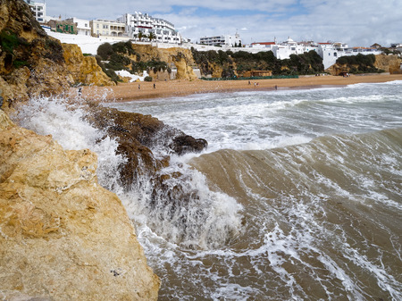ALBUFEIRA, SOUTHERN ALGARVE/PORTUGAL - MARCH 10 : View of the Beach at Albufeira in Portugal on March 10, 2018. Unidentified peopleのeditorial素材