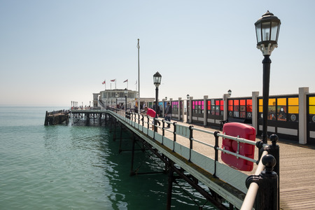WORTHING, WEST SUSSEX/UK - APRIL 20 : View of Worthing Pier in West Sussex on April 20, 2018. Unidentified peopleのeditorial素材