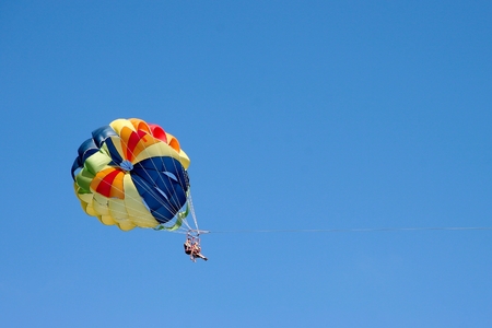 GRAN CANARIA, CANARY ISLANDS/SPAIN - FEBRUARY 23 : Two People Paragliding off a Beach in Gran Canaria on February 23, 2007. Unidentified people.のeditorial素材