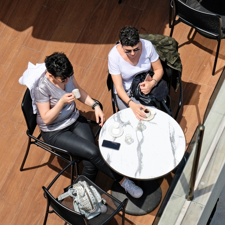 ISTANBUL, TURKEY - MAY 24 : Ladies enjoying a coffee in Istanbul Turkey on May 24, 2018. Two...