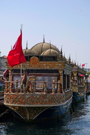 ISTANBUL, TURKEY - MAY 24 : View of Chinese floating restaurants along the Bosphorus in Istanbul Turkey on May 24, 2018. Two unidentified peopleのeditorial素材