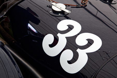 GOODWOOD, WEST SUSSEX/UK - SEPTEMBER 14 : Number 33 on an old  vintage car at Goodwood on September...
