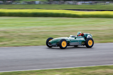 GOODWOOD, WEST SUSSEX/UK - SEPTEMBER 14 : Vintage Racing at Goodwood at Goodwood on September 14, 2012. One unidentified personのeditorial素材