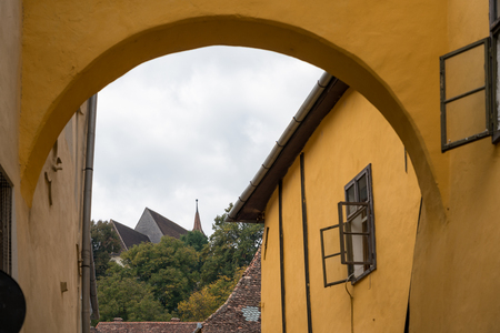 SIGHISOARA, TRANSYLVANIA/ROMANIA - SEPTEMBER 17 : Buildings in the medieval town of  Sighisoara Transylvania Romania on September 17, 2018の写真素材
