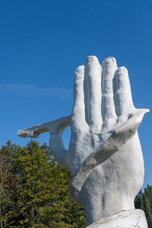 SUCEVITA, MOLDOVIA/ROMANIA - SEPTEMBER 18 : White hand statue near Sucevita in Moldovia Romania on September 18, 2018のeditorial素材