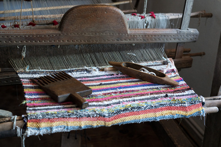 TARPESTI, MOLDOVIA/ROMANIA - SEPTEMBER 19 : Old loom in the Neculai Popa Ethnographic Museum in Tarpesti in Moldovia Romania on September 19, 2018のeditorial素材