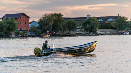 TULCEA, DANUBE DELTA/ROMANIA - SEPTEMBER 22 : High speed boat  travelling from Tulcea Danube Delta...
