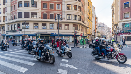 VALENCIA, SPAIN - FEBRUARY 24 : Motorcycle and scooter rally in Valencia Spain on February 24, 2019. Unidentified peopleのeditorial素材