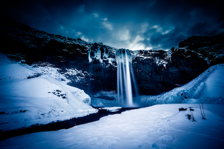 View of Seljalandfoss Waterfall in Winterの写真素材