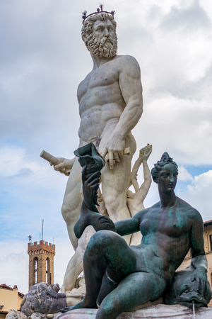 FLORENCE, TUSCANY/ITALY - OCTOBER 19 : Detail from the Fountain of Neptune statue Piazza della Signoria in front of the Palazzo Vecchio Florence on October 19, 2019のeditorial素材