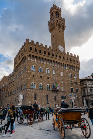 FLORENCE, TUSCANY/ITALY - OCTOBER 19 : View of Vecchio Palace  in Florence on October 19, 2019. Unidentified peopleのeditorial素材