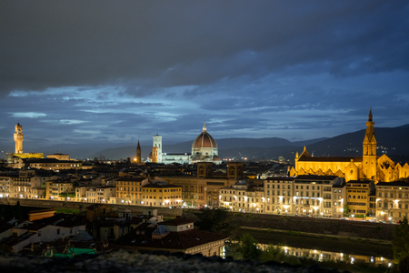 FLORENCE, TUSCANY/ITALY - OCTOBER 18 : Distant view of Florence Cathedral and Santa Croce Basilica at dusk in Florence on October 18, 2019のeditorial素材
