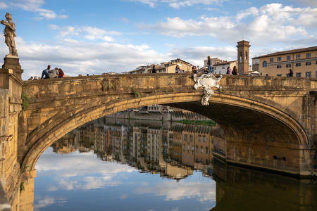 FLORENCE, TUSCANY/ITALY - OCTOBER 18 : View of buildings along and across the River Arno in Florence  on October 18, 2019. Unidentified people.のeditorial素材