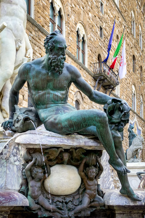 FLORENCE, TUSCANY/ITALY - OCTOBER 19 : Detail from the Fountain of Neptune statue Piazza della Signoria in front of the Palazzo Vecchio Florence on October 19, 2019のeditorial素材