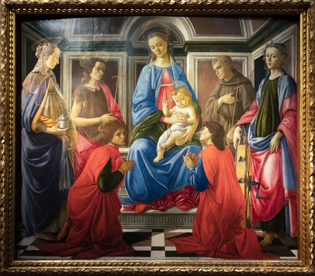 FLORENCE, TUSCANY/ITALY - OCTOBER 19 : Madonna and child with St John the Baptist painting in the...