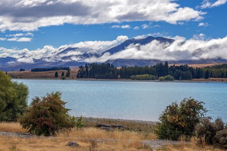 Scenic view of Lake Tekapo in the South Island of New Zealandの写真素材