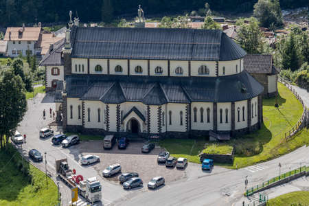 FALCADE, VENETO/ITALY - AUGUST 11 :  The church of Our Lady Immaculate in Falcade, Veneto, Italy on August 11, 2020. Unidentified peopleのeditorial素材