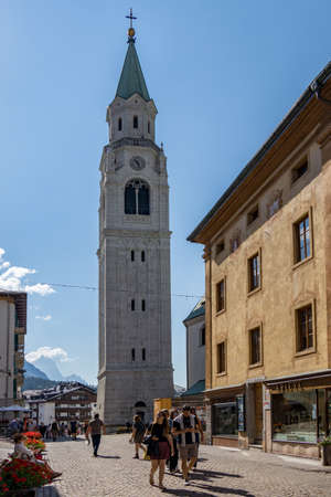 CORTINA D'AMPEZZO, VENETO/ITALY - AUGUST 9 :   View of SS Philip and Jacob Parish Church in Cortina d'Ampezzo, Veneto Italy on August 9, 2020. Unidentified peopleのeditorial素材