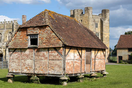 MIDHURST, WEST SUSSEX/UK - SEPTEMBER 1 : View of the Cowdray Castle medieval granary set on toadstools to prevent access by rats in Midhurst, West Sussex on September 1, 2020のeditorial素材