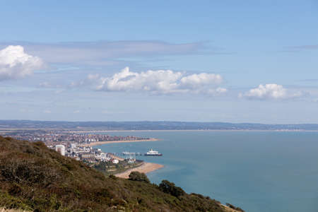 Distant view of Eastbourne in East Sussex from the South Downsの写真素材