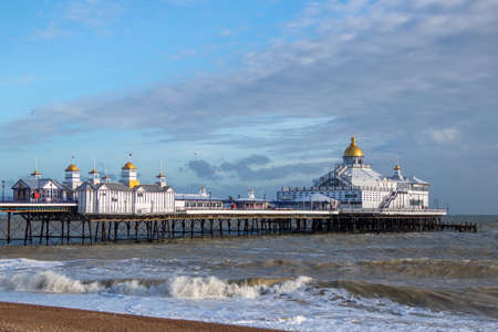 EASTBOURNE, EAST SUSSEX/UK - JANUARY 7 : View of Eastbourne Pier in East Sussex on January 7, 2018. Four unidentified peopleのeditorial素材