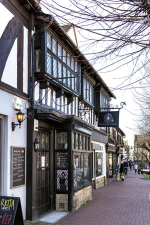 EAST GRINSTEAD, WEST SUSSEX, UK - MARCH 9 : Shops closed because of the lockdown due to coronavirus in East Grinstead on March 9, 2021. Unidentified peopleのeditorial素材