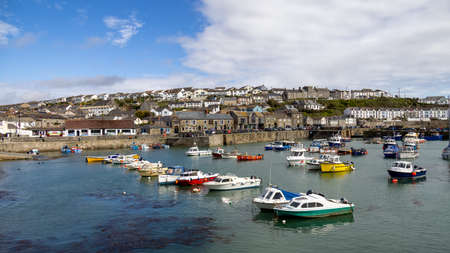 PORTHLEVEN, CORNWALL, UK - MAY 11 : View of the town and harbour in Porthleven, Cornwall on May 11,...