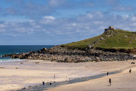 ST IVES, CORNWALL, UK - MAY 13 : View of Porthmeor beach at St Ives, Cornwall on May 13, 2021....