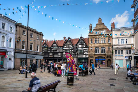 SHREWSBURY, SHROPSHIRE, UK - JULY 13 : View of old buildings in Shrewsbury, Shropshire on July 13, 2021. Unidentified peopleのeditorial素材
