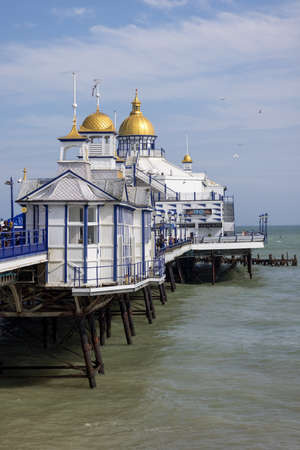 EASTBOURNE, EAST SUSSEX, UK - JULY 29 : View of Eastbourne Pier in East Sussex on July 29 2021. Unidentified peopleのeditorial素材