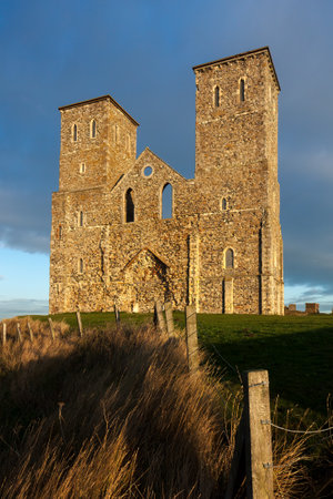 RECULVER, ENGLAND, UK - DECEMBER 10 : Remains of Reculver Church Towers Bathed in Late Afternoon Sun in Winter at Reculver in Kent on December 10, 2008のeditorial素材