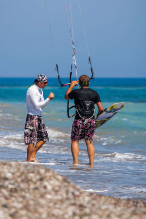 AVDIMOU, CYPRUS, GREECE - JULY 25 : Learning to kite surf in Avidmou Cyprus on July 25, 2009. Two unidentified men.のeditorial素材