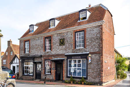 ALFRISTON, SUSSEX, UK - SEPTEMBER 13 : View of shops in the High Street at Alfriston, East Sussex on September 13, 2021のeditorial素材