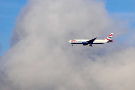 EAST GRINSTEAD, WEST SUSSEX, UK - NOVEMBER 11 : British Airways passenger jet flying over East Grinstead in West Sussex, UK on November 11, 2021のeditorial素材