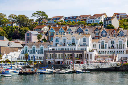 BRIXHAM, DEVON, UK - JULY 28 : View of boats in Brixham Marina in Devon on July 28, 2012. Unidentified peopleのeditorial素材